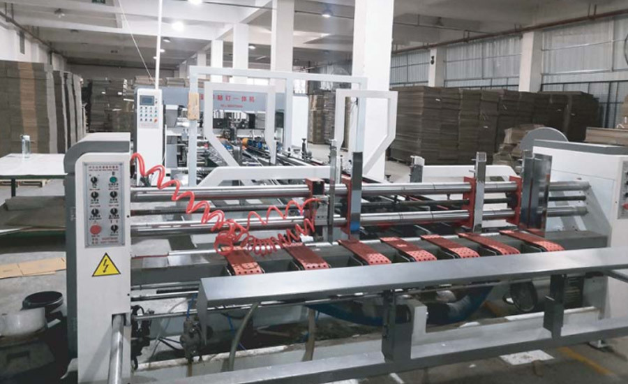 高(gāo)速糊釘箱一體機(jī)